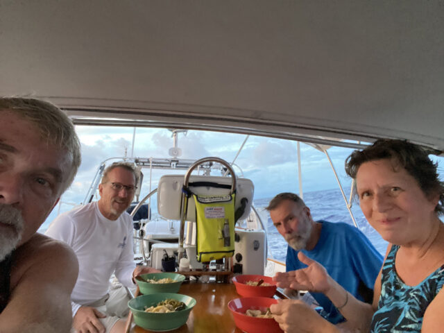 Crew at table having dinner