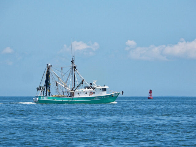 Fishing Boat heading out to sea