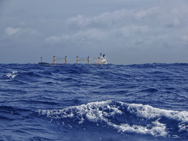 Passing Cargo Ship