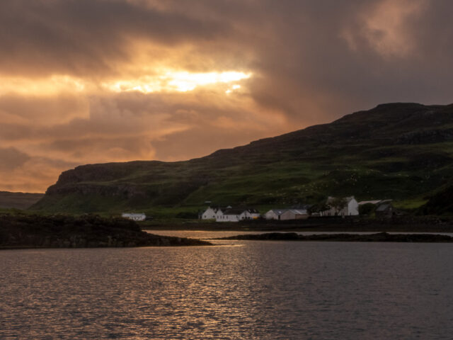 Farming Buildings On The Isle of Canna At Sunset After A Storm
