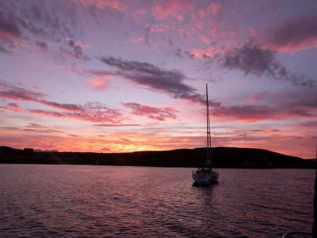 Sailboat In Canna Harbor At Sunrise